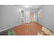 Simple bedroom with blue carpet and open closet at 4301 Se 38Th St, Ocala, FL 34480