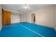 Simple bedroom with blue carpet and a large closet at 4301 Se 38Th St, Ocala, FL 34480