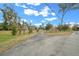 Long driveway leading to a charming house at 4301 Se 38Th St, Ocala, FL 34480
