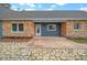 Brick house with a blue front door and stone pathway at 4301 Se 38Th St, Ocala, FL 34480
