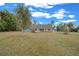 Two-story house with blue siding and a landscaped yard at 4301 Se 38Th St, Ocala, FL 34480