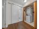 Laundry closet with washer, dryer, and barn door at 4301 Se 38Th St, Ocala, FL 34480