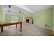 Living room with fireplace and ceiling fan at 4301 Se 38Th St, Ocala, FL 34480