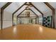 Large living area featuring high ceilings and wood beams at 4301 Se 38Th St, Ocala, FL 34480