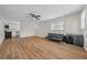 Living room with vinyl wood flooring and open floor plan at 4301 Se 38Th St, Ocala, FL 34480