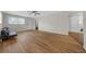 Living room with vinyl flooring and access to bathroom at 4301 Se 38Th St, Ocala, FL 34480