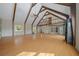 Open living room with high ceilings and wood beams at 4301 Se 38Th St, Ocala, FL 34480