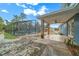 Covered patio next to pool and house at 4301 Se 38Th St, Ocala, FL 34480