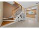 Wooden staircase with built-in storage underneath at 4301 Se 38Th St, Ocala, FL 34480