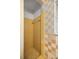 Small bathroom with yellow tile shower and walls at 438 Spring Ln, Ocala, FL 34472