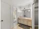 Bathroom with a vanity, toilet, and access to exterior at 438 Spring Ln, Ocala, FL 34472