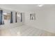 Simple bedroom with tile floors and two windows at 438 Spring Ln, Ocala, FL 34472