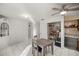 Bright dining area with built-in shelving and table at 438 Spring Ln, Ocala, FL 34472