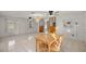 Dining area with wood table and chairs at 438 Spring Ln, Ocala, FL 34472