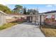 Home's entry with brickwork and covered patio at 438 Spring Ln, Ocala, FL 34472