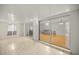 Sunroom with glass doors leading to living room at 438 Spring Ln, Ocala, FL 34472