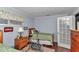 Relaxing bedroom with natural light and comfortable furnishings at 9708 Sw 97Th St, Ocala, FL 34481
