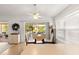 Bright breakfast nook featuring tile floors, drop leaf table, and a ceiling fan for comfortable dining at 12595 Se 97Th Terrace Rd, Summerfield, FL 34491