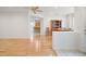 Bright and airy living room with hardwood floors that flows into the dining area at 13100 Se 94Th Ave, Summerfield, FL 34491