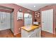 Pantry and storage with counter space next to a well-lit kitchen at 13370 Sw 112Th Pl, Dunnellon, FL 34432