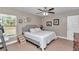 This bedroom features a large window and a decorative wall at 13661 Sw 43Rd Cir, Ocala, FL 34473