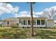 Sunroom with lots of natural light and a view of the backyard at 1517 New Abbey Ave, Leesburg, FL 34788