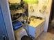 Bathroom with sink, toilet and decorative shelving at 17840 Se 28Th Pl, Silver Springs, FL 34488