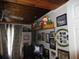 Bedroom with wood-paneled ceiling, wall decor, and fan at 17840 Se 28Th Pl, Silver Springs, FL 34488