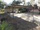 Spacious covered carport offering shade and parking at 17840 Se 28Th Pl, Silver Springs, FL 34488