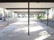 View from underneath the carport showcasing its structure and spacious area at 17840 Se 28Th Pl, Silver Springs, FL 34488