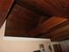 Wood-paneled vaulted ceiling with exposed beams at 17840 Se 28Th Pl, Silver Springs, FL 34488