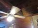 Wood-paneled ceiling with fan and light fixture at 17840 Se 28Th Pl, Silver Springs, FL 34488