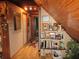 Hallway with wood floors and shelving at 17840 Se 28Th Pl, Silver Springs, FL 34488