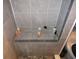 Shower with built-in seat and multiple shelves at 17840 Se 28Th Pl, Silver Springs, FL 34488