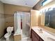 Clean bathroom with a double vanity, shower, and toilet at 2352 Nw 53Rd Avenue Rd, Ocala, FL 34482