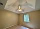 Spacious bedroom with a ceiling fan and neutral wall colors at 2352 Nw 53Rd Avenue Rd, Ocala, FL 34482