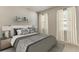 Guest bedroom with a queen-size bed and neutral color palette at 4062 Nw 48Th Terrace Rd, Ocala, FL 34482