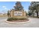 Elegant St. James Park community entrance with stone pillars and iron gates at 4470 Nw 2Nd Ct, Ocala, FL 34475