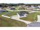 Overhead view of property highlighting white perimeter fence, manicured lawn and spacious layout at 6215 Se 13Th St, Ocala, FL 34472