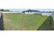 Fenced backyard featuring a lush lawn and plenty of space at 6215 Se 13Th St, Ocala, FL 34472