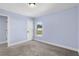 Cozy bedroom with soft carpet and a window offering natural light at 6215 Se 13Th St, Ocala, FL 34472