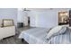 Bedroom with a large window, desk, and ensuite bathroom access at 6215 Se 13Th St, Ocala, FL 34472