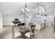 Open layout combining the dining room, living room, and kitchen, perfect for entertaining guests at 6215 Se 13Th St, Ocala, FL 34472