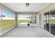 Screened lanai providing an excellent view of the backyard at 6215 Se 13Th St, Ocala, FL 34472