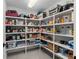 Well-stocked pantry with organized shelving, offering ample storage for food and household items at 6215 Se 13Th St, Ocala, FL 34472