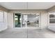 Covered patio with view of the home's interior, furniture, and kitchen at 6215 Se 13Th St, Ocala, FL 34472