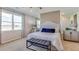 Spacious bedroom with large windows and plush bedding at 6238 Sw 93Rd Loop, Ocala, FL 34476