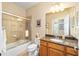 Well-appointed bathroom with granite countertop and tiled shower/tub combo at 7454 Sw 101St Ave, Ocala, FL 34481