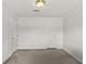 Simple bedroom with neutral walls and carpet flooring at 7601 Se 22Nd Ave, Ocala, FL 34480