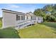 Exterior view of a house with a ramp at 7601 Se 22Nd Ave, Ocala, FL 34480